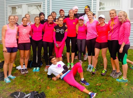 members of the cross country teams in preparation for the Run for the Cure